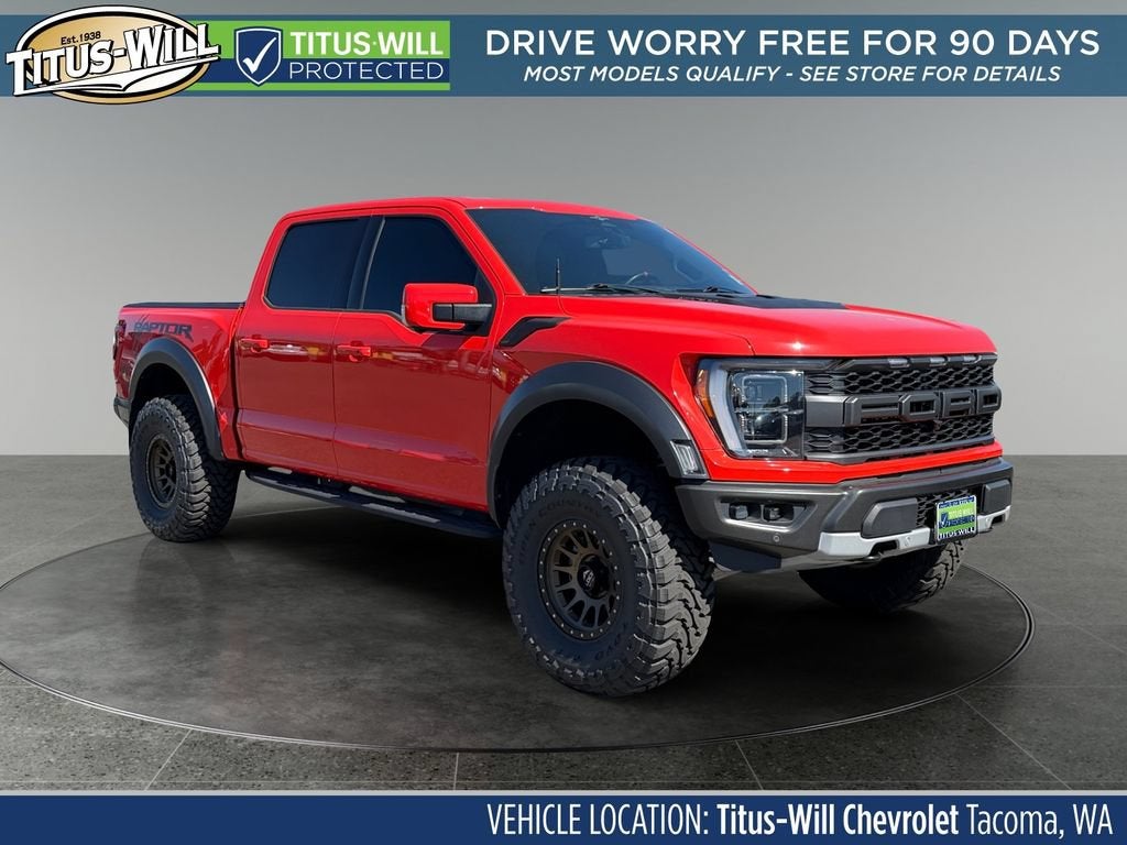 2023 Ford F-150 Raptor in Orange — front three-quarter view