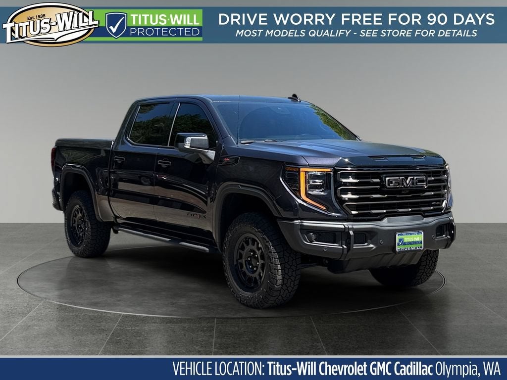 2026 GMC Sierra 1500 AT4X in Titanium Rush Metallic — front three-quarter view
