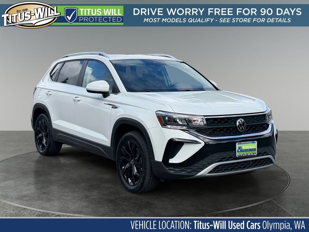 2023 Volkswagen Taos 1.5T SE in Pure White — front three-quarter view