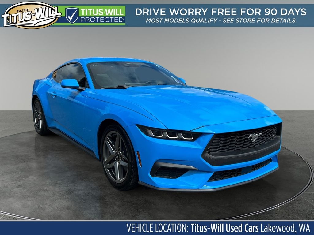 2024 Ford Mustang EcoBoost in Grabber Blue Metallic — front three-quarter view