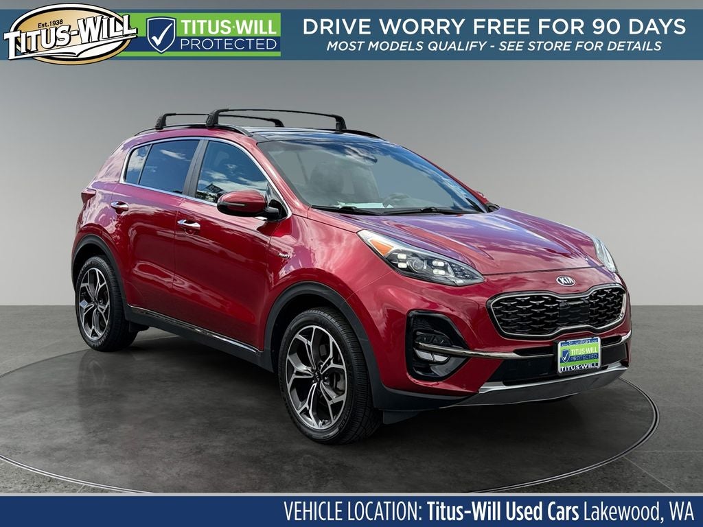 2021 Kia Sportage SX in Red — front three-quarter view