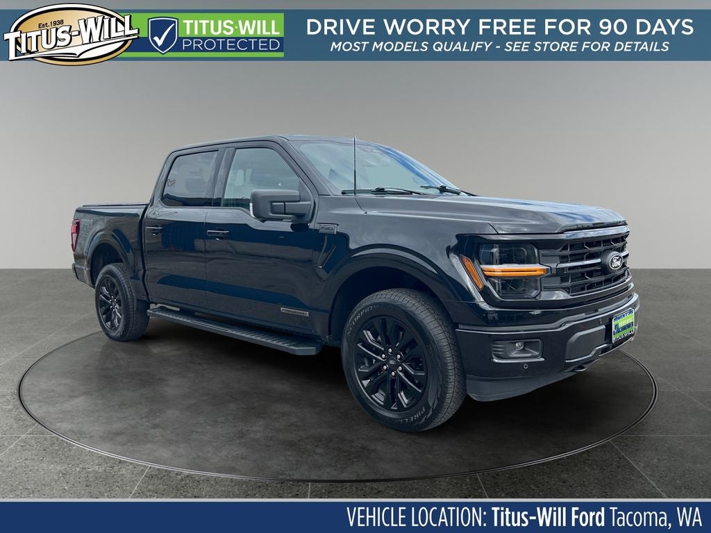 2025 Ford F-150 XLT in Black Metallic — front three-quarter view