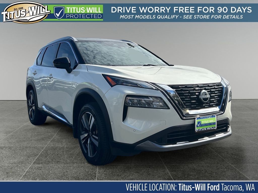 2023 Nissan Rogue SL in Pearl White — front three-quarter view