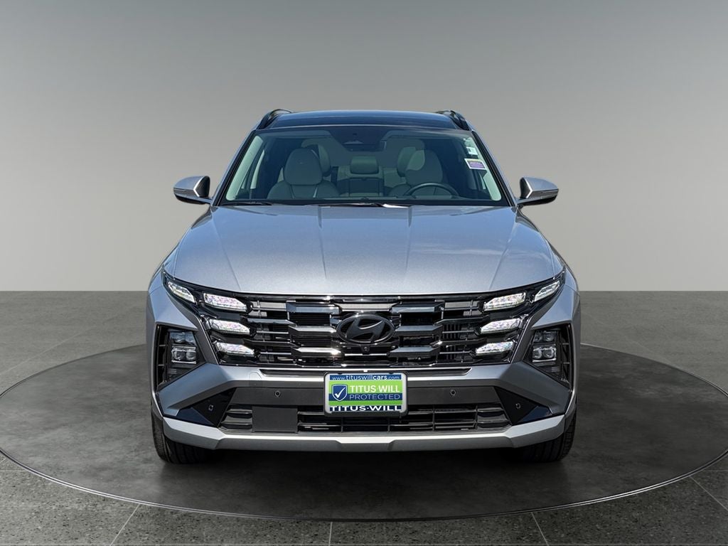2025 Hyundai Tucson Hybrid — side profile view