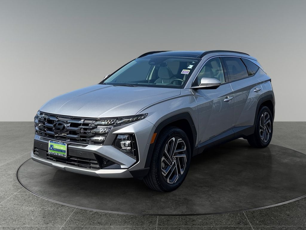 2025 Hyundai Tucson Hybrid — rear three-quarter view