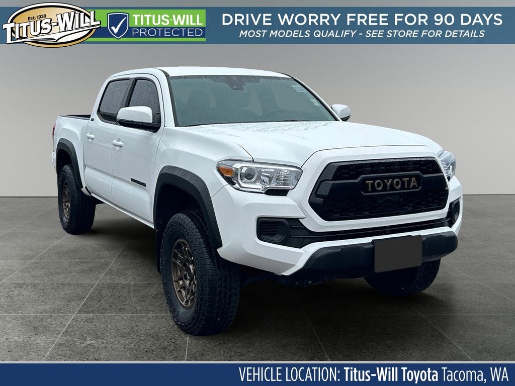 2023 Toyota Tacoma Trail Edition V6 in Ice Cap — front three-quarter view