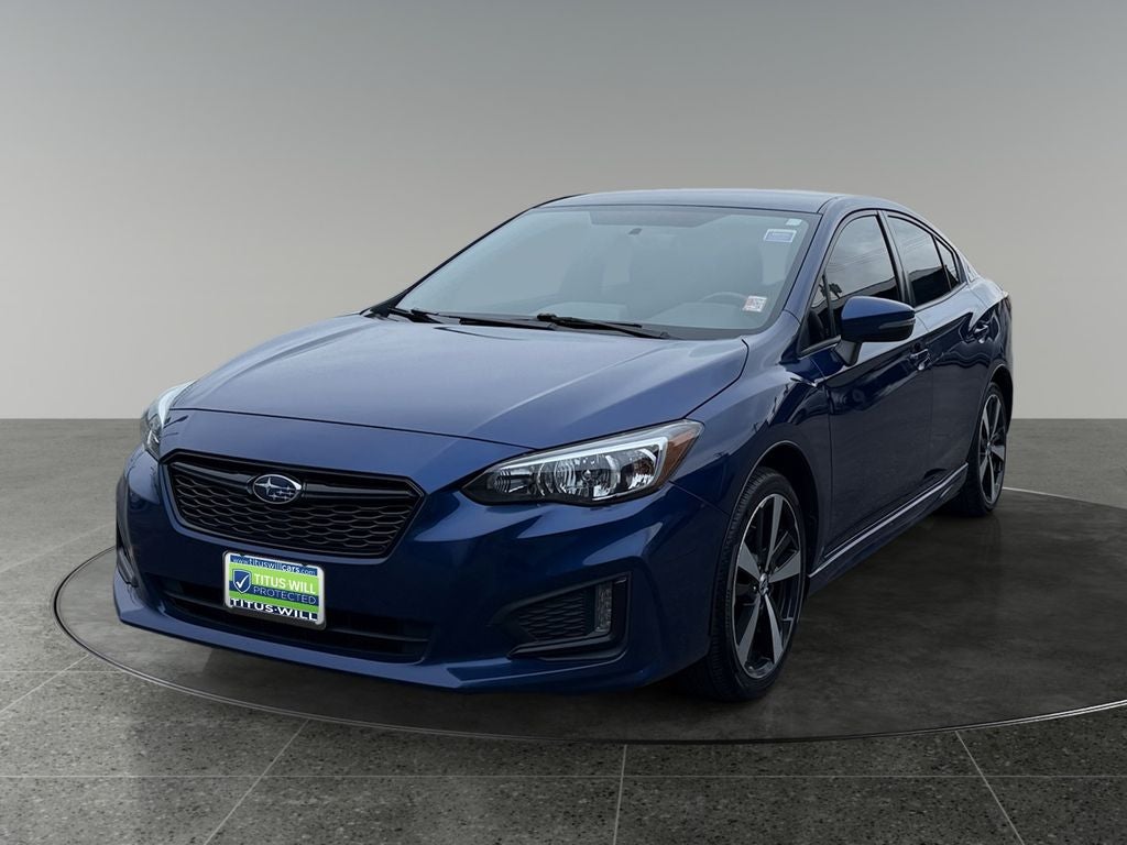 2017 Subaru Impreza — rear three-quarter view