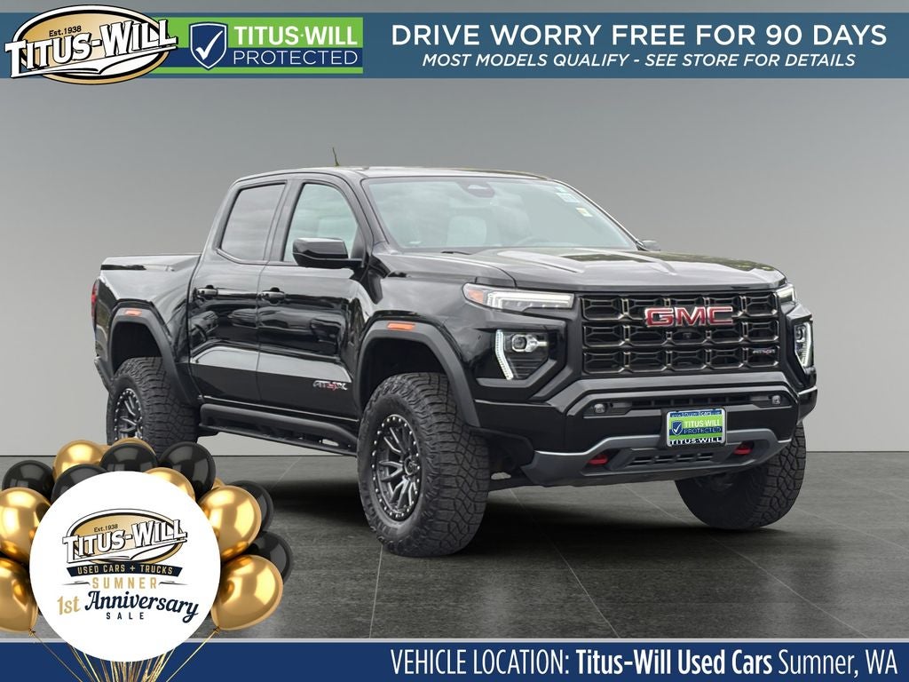 2024 GMC Canyon AT4X in Onyx Black — front three-quarter view