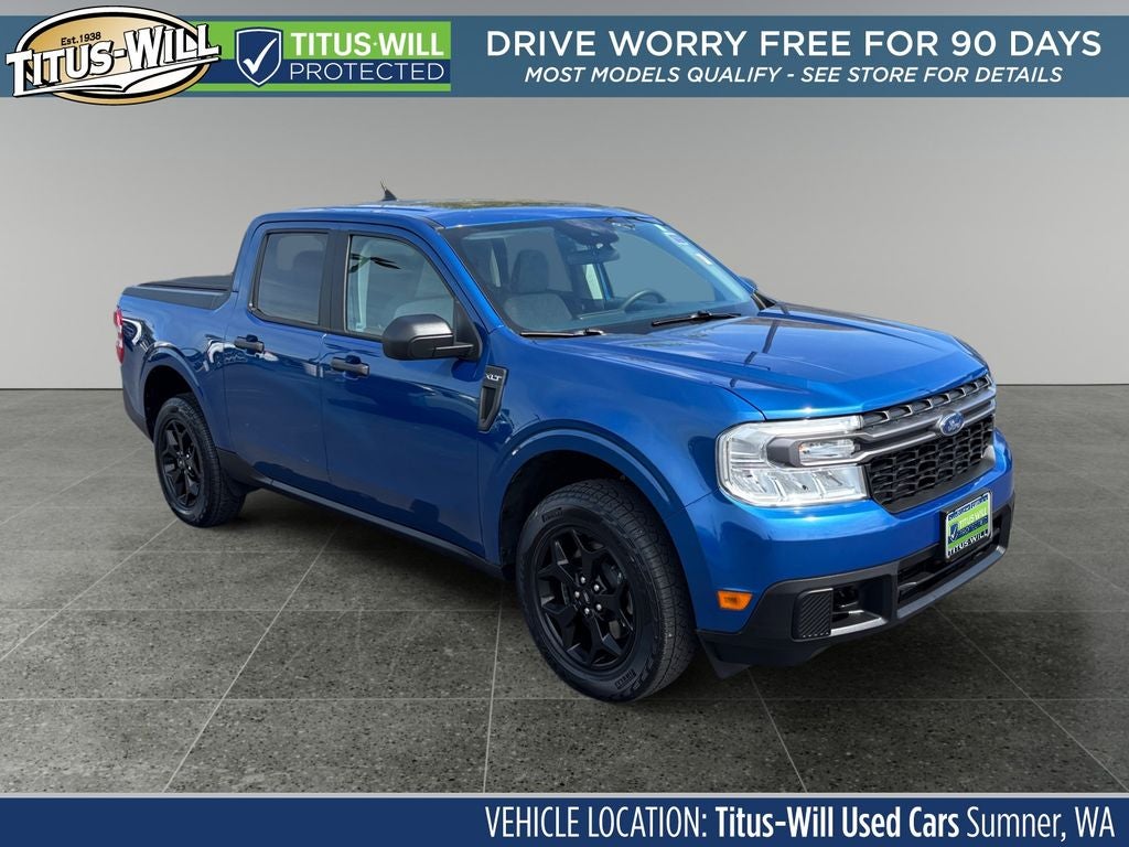 2023 Ford Maverick XLT in Blue Metallic — front three-quarter view